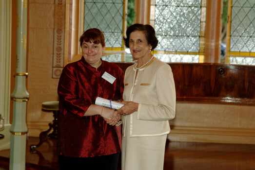 Governor General Dame Marie Bashir presenting an award to Julie Sappho