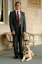 Kevin Murfitt with his dog guide at Government House