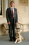 Kevin Murfitt with his dog guide at Government House