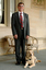 Kevin Murfitt with his dog guide at Government House