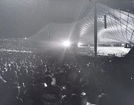 Side view of audience watching the stage at the Myer Music Bowl