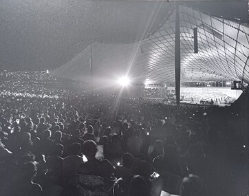 Side view of audience watching the stage at the Myer Music Bowl