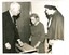 Sir Rohan speaking with a nurse and resident