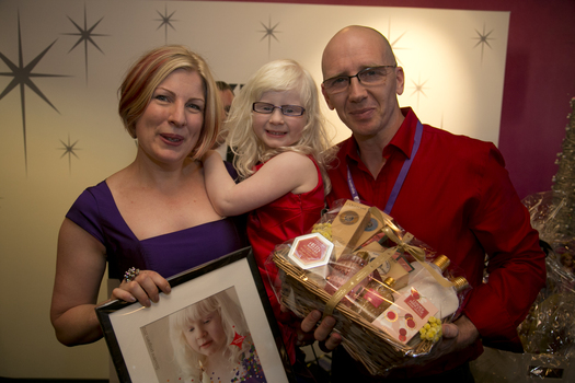 Cover girl Neva with her parents Amy and ?