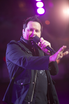 Scott Carne performing on the stage
