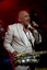 Joe Camilleri performing on the stage