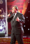 Shane Jacobson performing on the stage