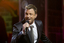 Tim Campbell performing on the stage