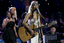 Delta Goodrem performing on the stage