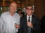 Male with Kevin Murfitt enjoying cupcakes