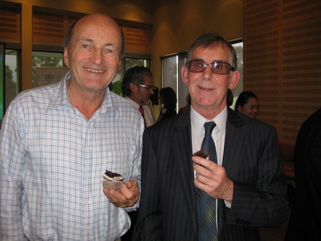 Male with Kevin Murfitt enjoying cupcakes