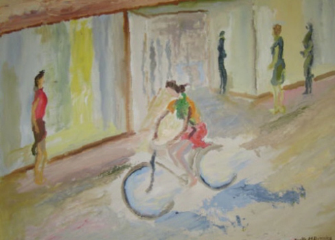 Person riding a bike along a street