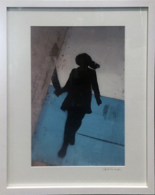 Girl walking around a corner