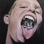 A portrait of a male face with tongue sticking out and a house inside the mouth
