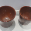 Two ceramic sherry glasses
