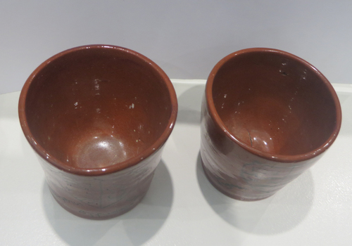 Two ceramic sherry glasses