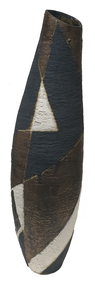 A ceramic vessel with geometric surface decoration