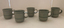 Six celadon green coffee cups