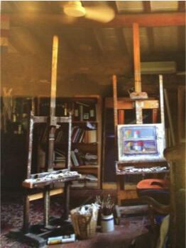 an artist's studio with prominent eisel 