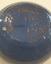 Base of small blue Osrey Bowl with inscription
