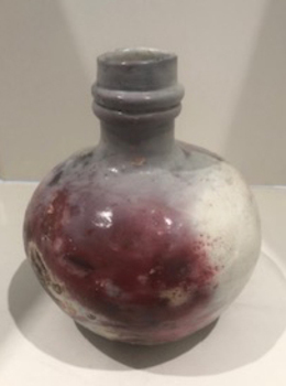 Large bulbous pit fired bottle
