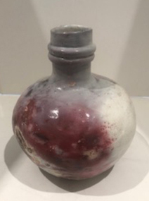 Large bulbous pit fired bottle