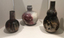 Three pit fired bottles by Sarah Canham
