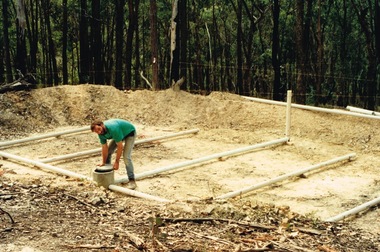 A member building a transpiration bed to recycle the household water.  This is a way of concentrating absorption trenches in a confined area, managing waste water and containing the soil disturbance to the site