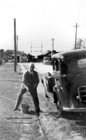 Photograph, Mr Perc Whitelaw outside his home, 1937
