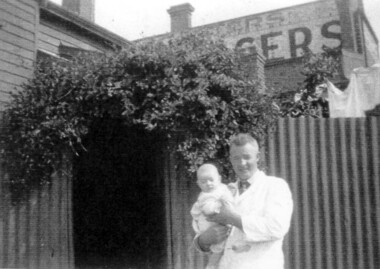 Photograph, Phillip Slavin with son Peter, in Stirling Crescent, Surrey Hills