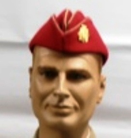 Coloured cap with army badge on side
