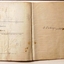 A very worn carbon-copy notebook.