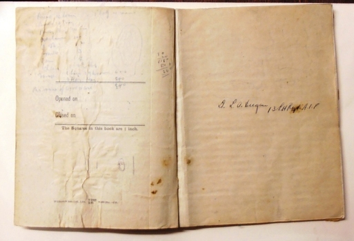 A very worn carbon-copy notebook.
