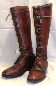 Pair of calf length lace-up boots