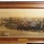 Framed photograph of soldiers on horses.