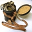 Face mask stored in tin box.