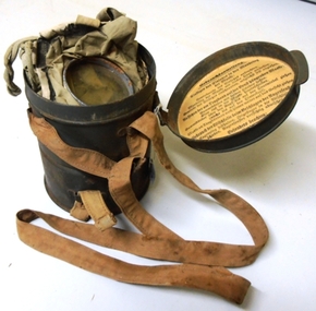 Face mask stored in tin box.