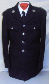 Soldier's uniform with silver buttons.