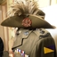 Soldier's uniform and hat with badge and feathers.