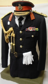 Army officers dress uniform with coloured medals and cords