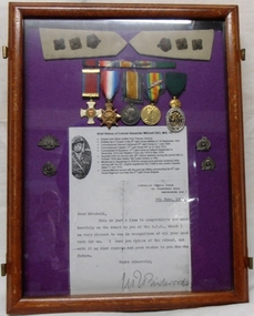 Framed set of medals and letter