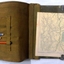 Case opened to show map and pencils