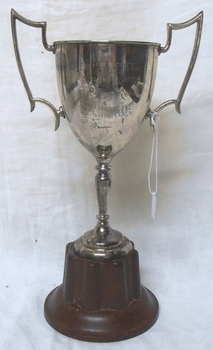 Silver cup with two handles and base