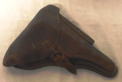 Leather case shaped like a pistol.