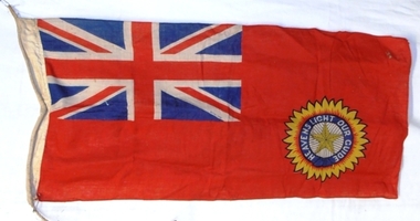 Multi coloured flag with rope on one edge.