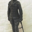 Small sculpture of soldier on wooden base