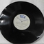Black vinyl disc  with recorded music