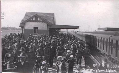Crowd of soldiers on railway platform