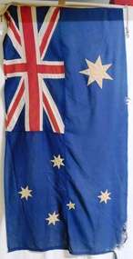Coloured flag with rope along one side.