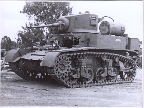Army vehicle with caterpillar tracks.